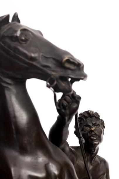 null D’après Nicolas COUSTOU (1658-1733) Les chevaux de Marly Suite de deux bronzes...