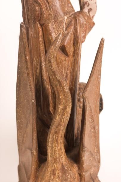 null Sainte Marguerite en chêne sculpté en ronde-bosse avec restes de polychromie...
