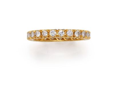  Alliance «américaine» en or jaune 18K 750‰ sertie de 23 diamants de taille brillant....
