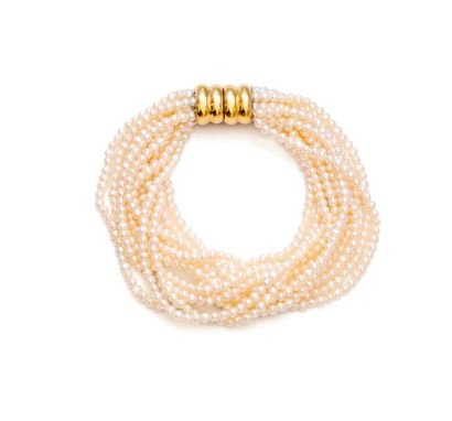 null Collier et bracelet en tresse de perles de culture, fermoirs en or jaune 18K...