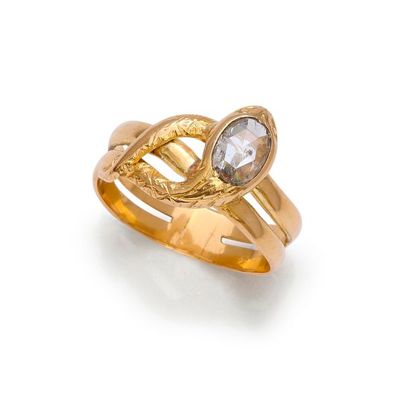 null Bague d’homme en or jaune 18K 750‰, en forme de serpent enroulé, la tête sertie...