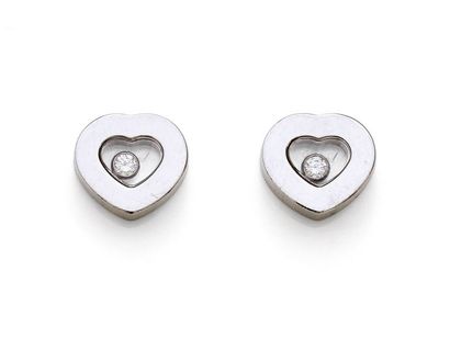 null CHOPARD

Paire de clous d’oreilles en or gris 18K 750‰,

modèle «Happy diamond»...