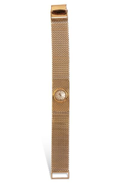 null OMEGA 

Lady's watch strap in 18K yellow gold 750/1000 with mechanical movement....