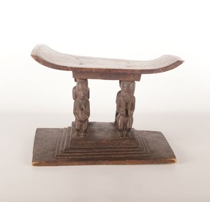 RDC, Congo Carved wood stool with caryatids. 34.5 x 48.