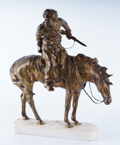 René PARIS (1881-1970) Cosaque à cheval dans la neige. Bronze à patine mordorée et...