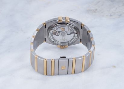 Oméga Omega Constellation Coaxial Ref: 12031000. Gold and steel, automatic. Certified...