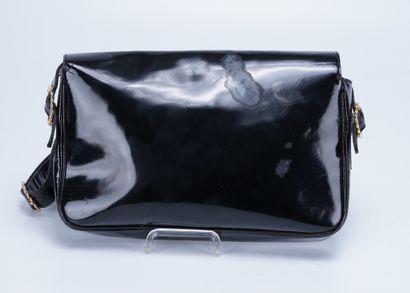 CELINE Black patent leather Céline bag with brass buckle. 19 x 27cm. Moisture st...