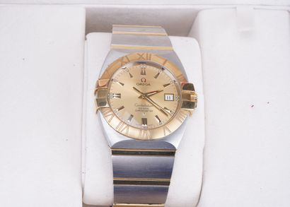 Oméga Omega Constellation Coaxial Ref: 12031000. Gold and steel, automatic. Certified...