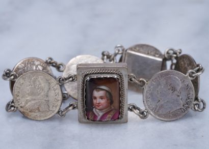 Bracelet Bracelet featuring a painted portrait of the pope and 6 silver coins of...