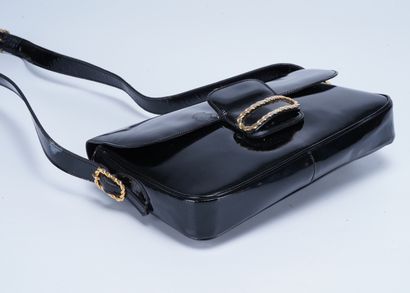 CELINE Black patent leather Céline bag with brass buckle. 19 x 27cm. Moisture st...