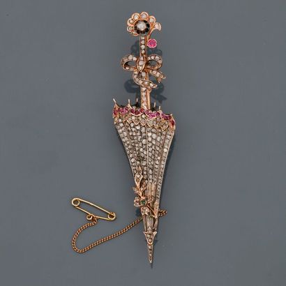 null Brooch featuring an umbrella in 9K gold and 925 MM silver, covered with pink-cut...