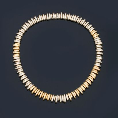 null POMELLATO, Rare articulated necklace made of smooth yellow gold, smooth white...