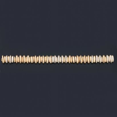 null POMELLATO, Bracelet made of meshes in smooth yellow gold, smooth white gold...