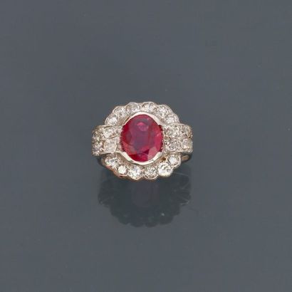 null Ring drawing a white gold plate, 750 MM, centred on a transparent oval ruby...