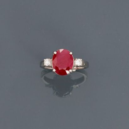 null White gold ring, 750 MM, decorated with an oval Burmese ruby weighing 5.06 carats...