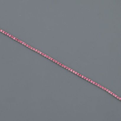 null White gold line bracelet, 750 MM, highlighted with sixty-three pink rubies,...