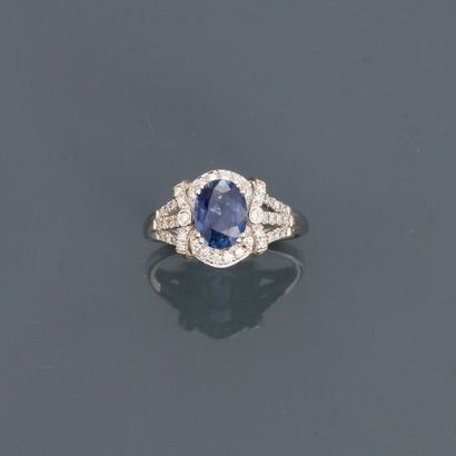 null White gold ring, 750 MM, decorated with a sapphire weighing approximately 1.70...
