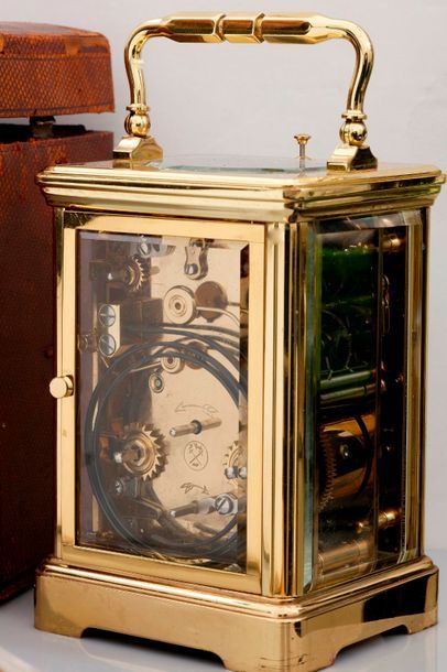 null Brass officer's bell clock, Manufacture "L'épée" de Montbéliard, handle, columns,...