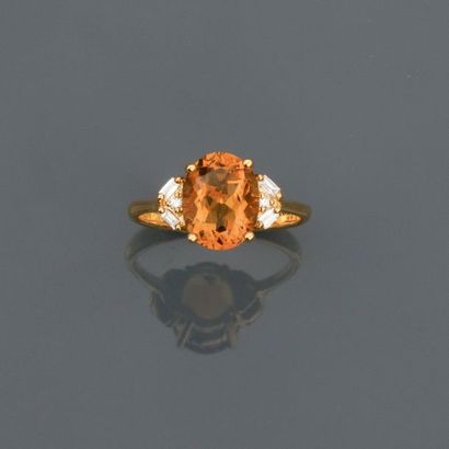 null Yellow gold ring, 750 MM, decorated with an oval citrine weighing 2.50 carats...