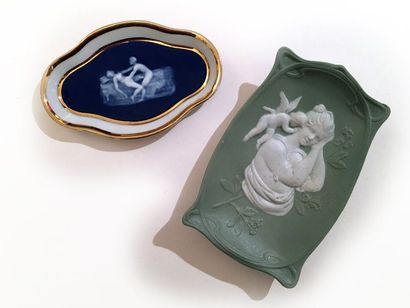 null 2 ashtrays. One in biscuit with a hidden scene, circa 1900, and the other in...