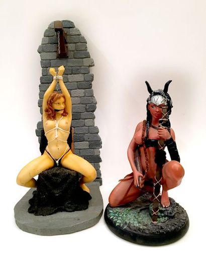null 2 statuettes en résine représentant une prisonniére dénudée, 32 cm, et une héroïne...