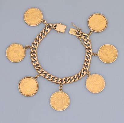 null Bracelet gourmette en or jaune, 750 MM, portant sept pièces de 20 F. ( 1859,...