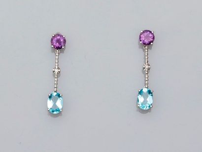 null Thin earrings in white gold, 750 MM, each adorned with a round amethyst, a diamond...