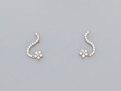 null Movement earrings in white gold, 750 MM, covered with diamonds, size 17 x 10...