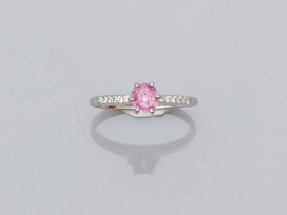 null Solitaire ring in white gold, 750 MM, set with an oval pink sapphire weighing...