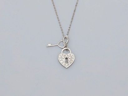 null Chain and pendant in white gold, 750 MM, drawing a heart and a small key covered...