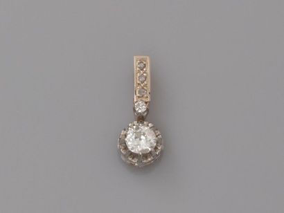 null Charming pendant in gold 750MM and, silver 925 MM, set with a round diamond...