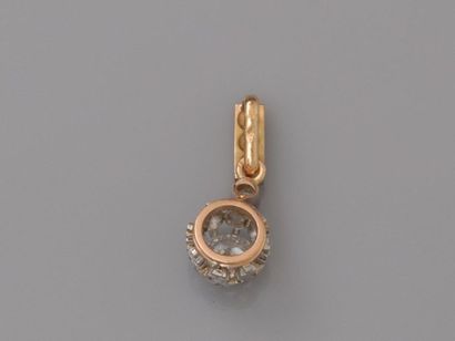 null Charmant pendentif en or 750MM et, argent 925 MM, orné d'un diamant rond pesant...