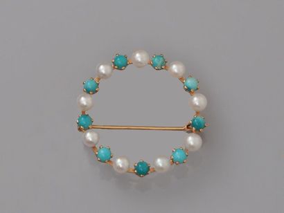 null Charming round brooch in pink gold, 750 MM, highlighted with small turquoise...