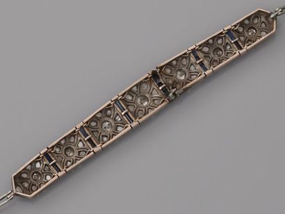 null Fine pink gold bracelet, 375 MM, made of rectangular links centred on seven...