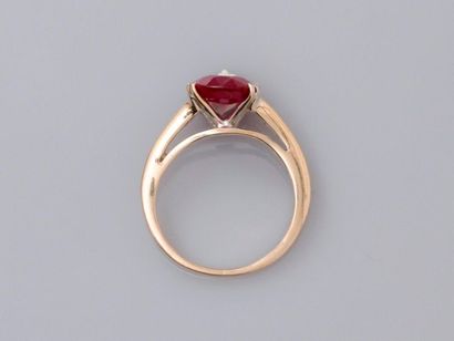 null Ring in white gold, 750 MM, decorated with an oval ruby weighing about 2.80...