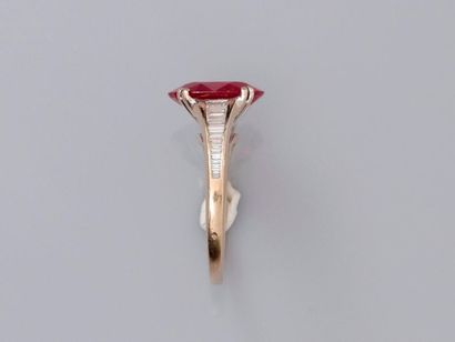 null Ring in white gold, 750 MM, decorated with an oval ruby weighing about 2.80...