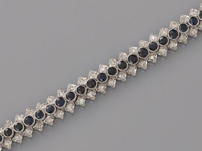 null Line bracelet in white gold, 750 MM, highlighted with round sapphires between...