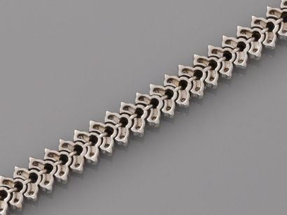null Line bracelet in white gold, 750 MM, highlighted with round sapphires between...