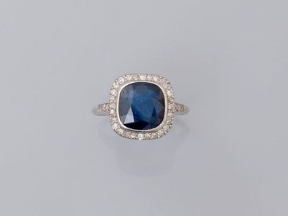 null Ring in, platinum, 900 MM, centered on a cushion-cut natural sapphire weighing...
