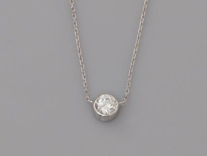 null Chain and pendant in white gold, 750 MM, adorned with a beautiful brilliant-cut...