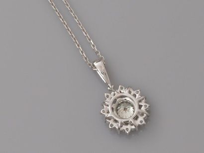 null Chain and nice pendant in white gold, 750 MM, centered on a brilliant-cut diamond...