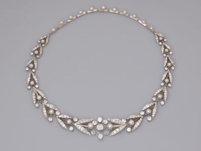 null Necklace transformable into , platinum 900 MM, drawing two scraps of floral...