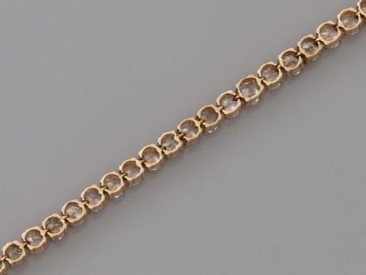 null Bracelet ligne articulé en or jaune, 750 MM, souligné de diamants, total 4 carats...