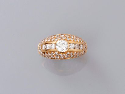 null Domed ring in yellow gold, 750 MM, covered with diamonds around a brilliant...