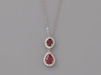 null Chain and pendant in white gold, 750 MM, decorated with two rubies each surrounded...