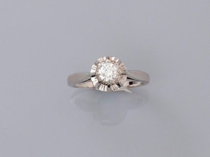 null Solitaire ring in white gold 750MM and, platinum 900 MM, set with a brilliant...