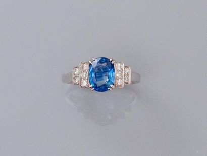null Ring in white gold, 750 MM, set with an oval sapphire weighing 1.70 carat and...