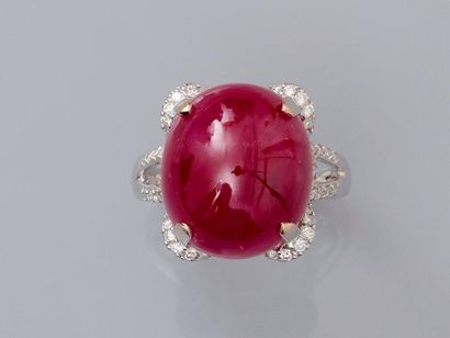 null Ring in white gold, 750 MM, decorated with a large cabochon-cut ruby weighing...