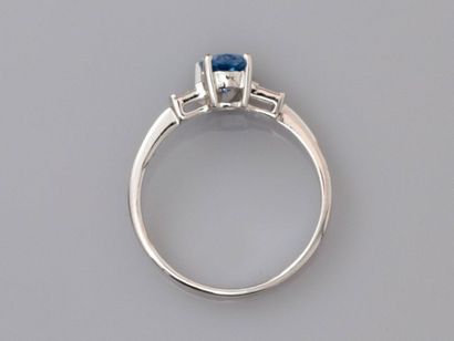 null Ring in white gold, 750 MM, set with an oval sapphire weighing 1.15 carat and...