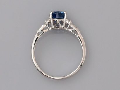 null Ring in white gold, 750 MM, set with an oval sapphire weighing 2.15 carats,...